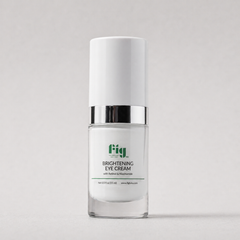 Fig MD Brightening Eye Cream tube with natural background, emphasizing anti-aging and brightening benefits.