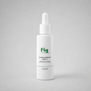 Fig MD Glow & Bright Daily C serum bottle with bright, radiant skin background